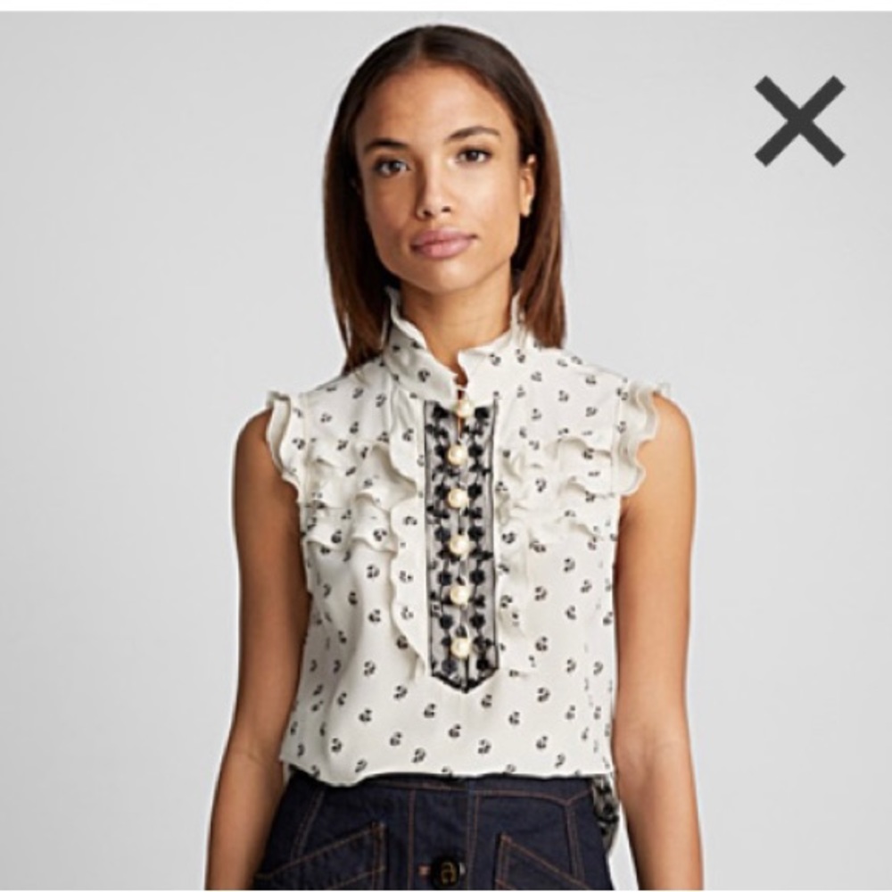 Silk top. Add some elastic to prevent buttons to open by a professional tailor!